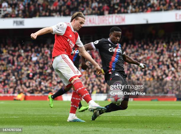 Rob Holding of Arsenal is closed down by Marc Guehi of Palace during the Premier League match between Arsenal FC and Crystal Palace at Emirates...