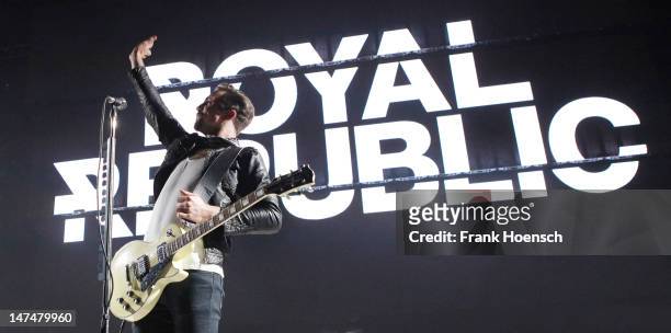 Singer Adam Grahn of the band Royal Republic performs live in support of Blink 182 during a concert at the Max-Schmeling-Halle on June 30, 2012 in...