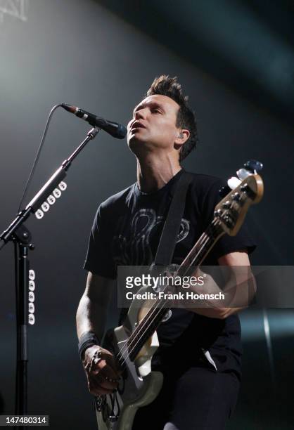 Singer Mark Hoppus of the band Blink 182 performs live during a concert at the Max-Schmeling-Halle on June 30, 2012 in Berlin, Germany.