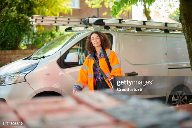 female contractor arrives at job - tradesman van stock pictures, royalty-free photos & images