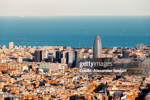 Modern skyscrapers of 22@ technological district against Mediterranean sea in Barcelona, Spain Modern skyscrapers of 22@ technological district against Mediterranean sea in Barcelona, Spain