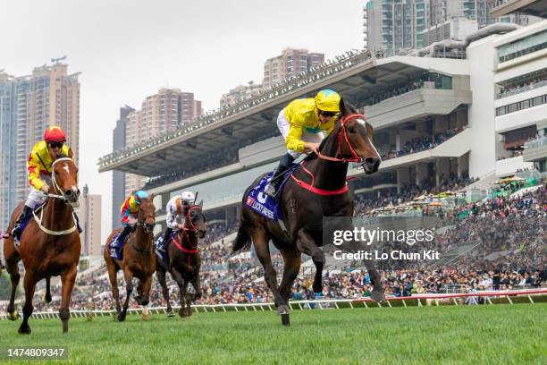 Jockey James McDonald riding Lucky Sweynesse wins the Race 7 Queen's Silver Jubilee Cup at Sha Tin Racecourse on March 19, 2023 in Hong Kong.