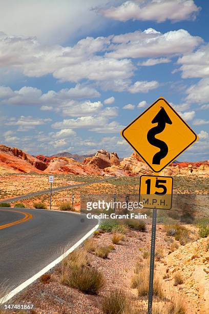 view of desert roadway. - nevada stockfoto's en -beelden