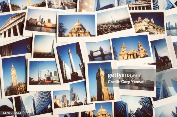 instant film photos of london - flat lay photography stock-fotos und bilder