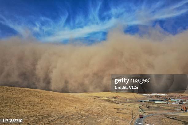 An approaching sandstorm is seen on March 20, 2023 in Zhangye, Gansu Province of China.