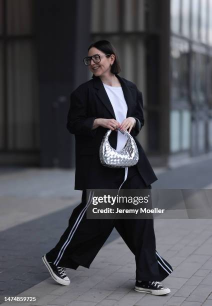 Maria Barteczko seen wearing Victoria Beckham black oversized Aviator glasses, WENDYKEI black oversized blazer, WENDYKEI white asymmetric shirt,...