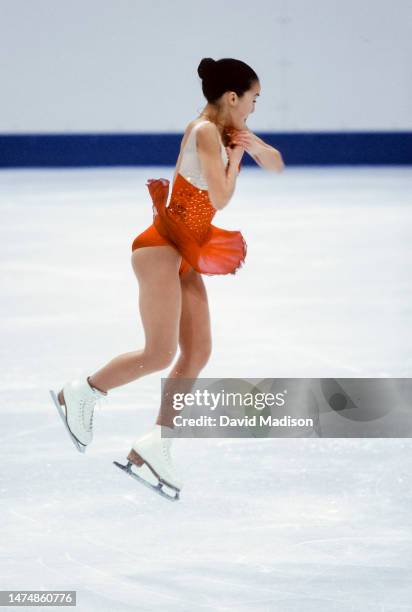 Michelle Kwan of the USA skates the short program in the Ladies Singles event of the Figure Skating competition of the 1998 Winter Olympics on...