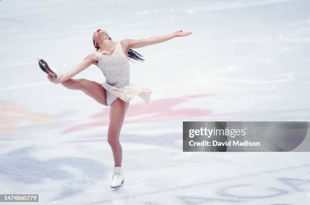 Michelle Kwan of the USA skates in the exhibition program of the Figure Skating competition at the 1998 Winter Olympics on February 21, 1998 in...