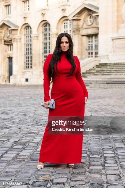 Ashley Graham wears Victoria Beckham outside the Victoria Beckham show on March 03, 2023 in Paris, France.