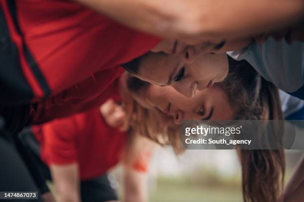 rugby players in a scrum - female rugby stock pictures, royalty-free photos & images