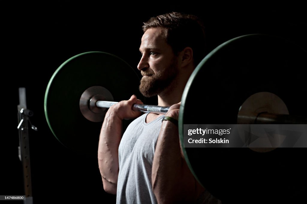 Man weightlifting in gym