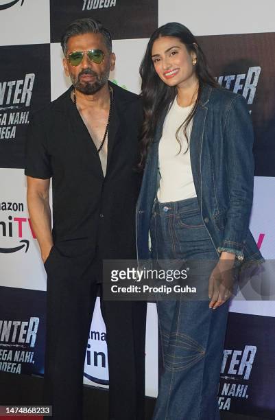 Suniel Shetty and Athiya Shetty attend the Amazon MiniTV's movie 'Hunter-Tootega Nahi Todegaon' screening March 20, 2023 in Mumbai, India