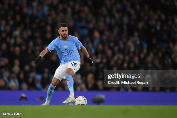 Riyad Mahrez of Manchester City in action during the Emirates FA Cup Quarter Final between Manchester City and Burnley at Etihad Stadium on March 18,...