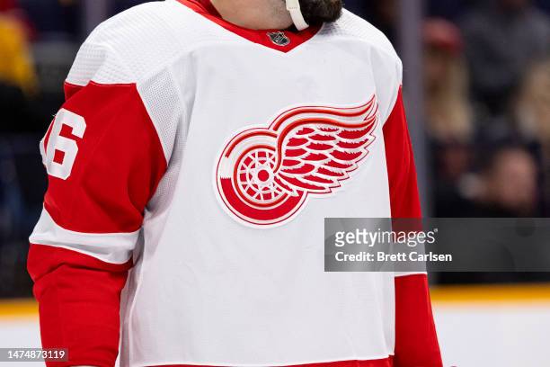 Detail of the Detroit Red Wings logo on a players sweater during the first period against the Nashville Predators at Bridgestone Arena on March 14,...