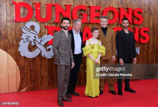 Justice Smith, Hugh Grant, Sophia Lillis, Chris Pine and Regé-Jean Page attend the "Dungeons And Dragons" Premiere at Zoopalast on March 20, 2023 in...