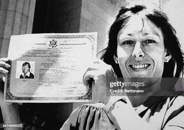 Martina Navratilova holds her U.S. Citizenship papers on the... News