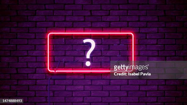 question sign in neon lights - ausrufezeichen stock-fotos und bilder