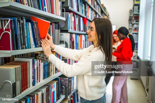 Reaching Books 668 Reaching Book Shelf Stock Photos, High-Res Pictures, and Images ...