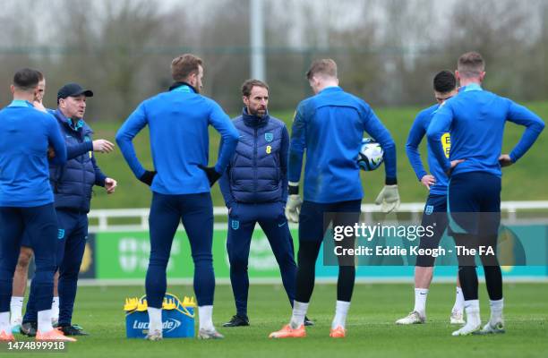 Steve Holland, Assistant Manager of England, and Gareth Southgate, Manager of England, talk to players during a training session at St George's Park...