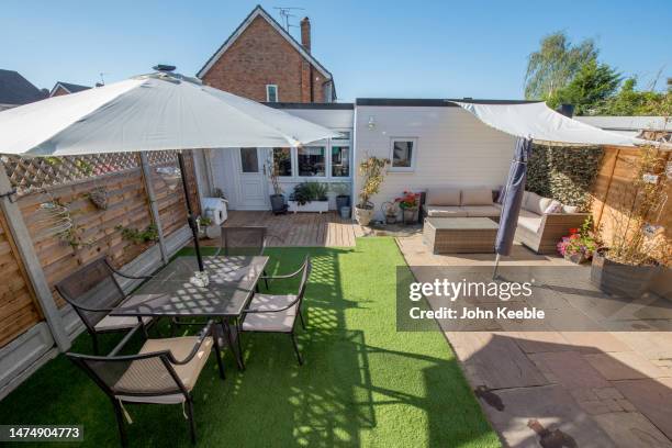 property garden exteriors - shade sail stock pictures, royalty-free photos & images