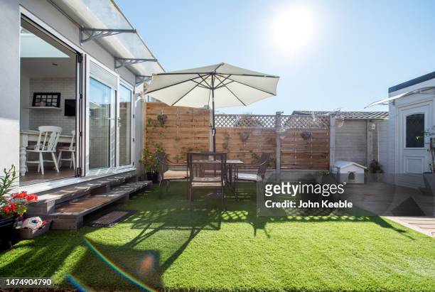 property garden exteriors - artificial grass stock pictures, royalty-free photos & images