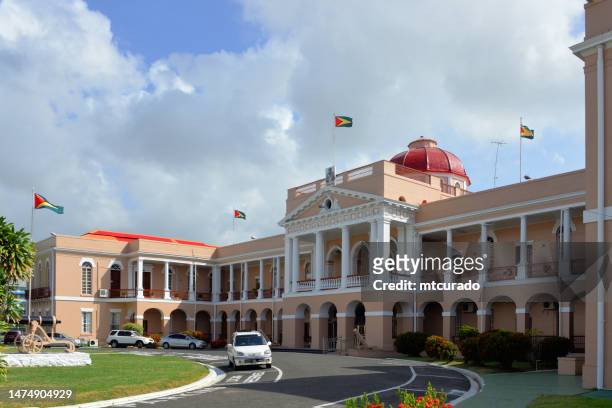 parliament of guyana, georgetown, guyana - guyana flag stock pictures, royalty-free photos & images