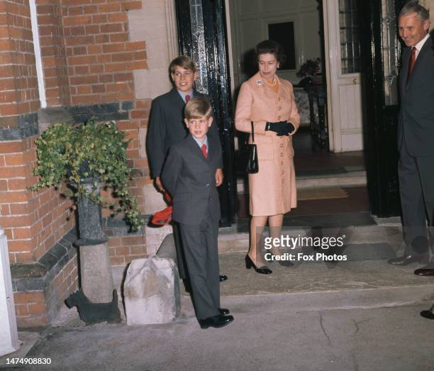 Queen Elizabeth II pictured with her sons Prince Andrew and Prince Edward as Prince Edward starts his first day at Heatherdown Preparatory School...