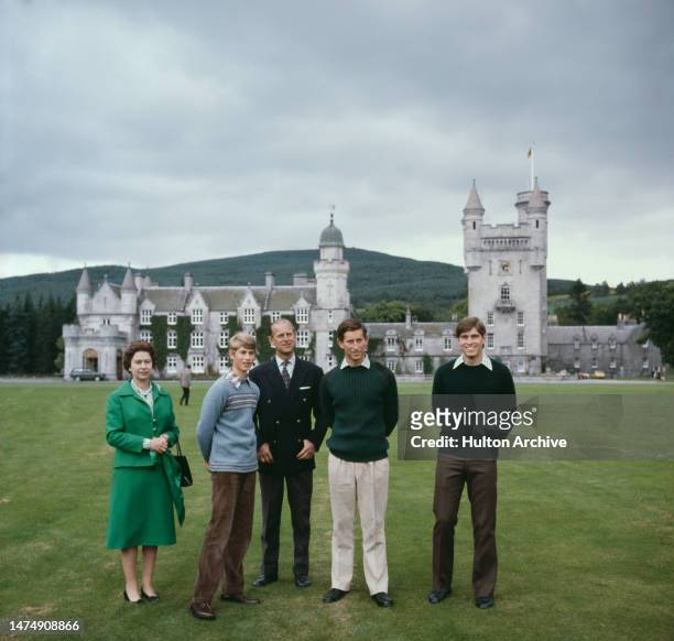 Queen Elizabeth II with Prince Philip, the Duke of Edinburgh and their sons Prince Edward , Prince Charles and Prince Andrew in the grounds of...