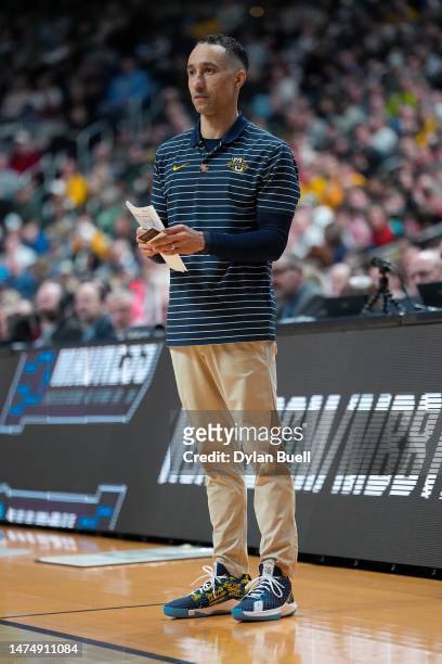 Head coach Shaka Smart of the Marquette Golden Eagles looks on against the Michigan State Spartans during the second half in the second round game of...
