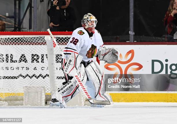 Alex Stalock of the Chicago Blackhawks gets ready to make a save against the Arizona Coyotes at Mullett Arena on March 18, 2023 in Tempe, Arizona.