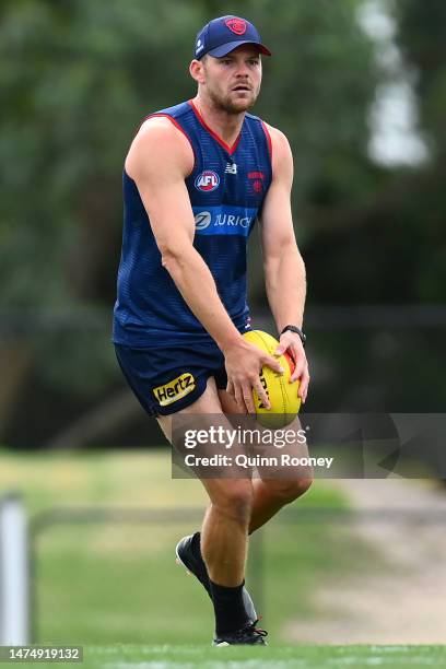 Steven May of the Demons kicks during a Melbourne Demons AFL training session at Casey Fields on March 21, 2023 in Melbourne, Australia.