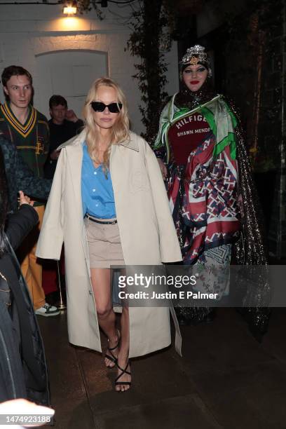 Pamela Anderson seen leaving the Tommy x Shawn: The "Classics Reborn" Global Activation VIP Dinner on March 20, 2023 in London, England.