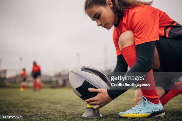 female rugby player preparing a penalty - women rugby stock pictures, royalty-free photos & images