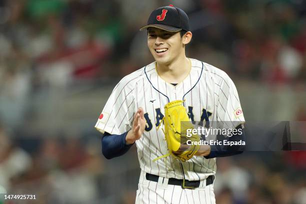 Roki Sasaki of Team Japan reacts after an out in the third inning against Team Mexico during the World Baseball Classic Semifinals at loanDepot park...