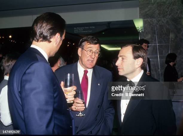 Former player agent Alan Eagleson talks with the new NHL commissioner Gary Bettman circa 1993.