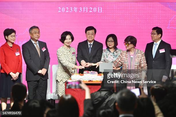Chairperson of Hong Kong Federation of Women Pansy Ho Chiu-king and Hong Kong Chief Executive John Lee Ka-chiu attend International Women's Day...