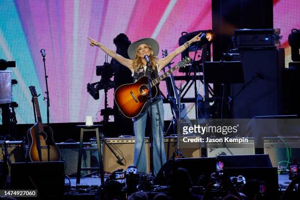 Sheryl Crow performs onstage during the Love Rising: Let Freedom Sing A Celebration Of Life, Liberty And The Pursuit Of Happiness show at Bridgestone...