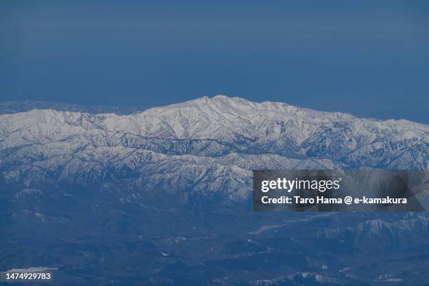 snowcapped mt. haku in gifu of japan aerial view from airplane - hakusan stock pictures, royalty-free photos & images