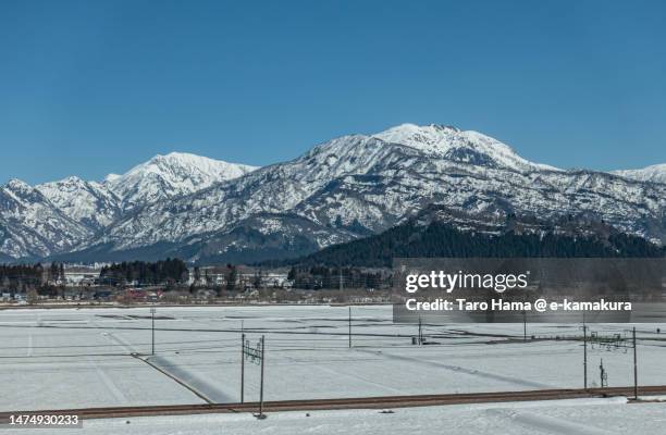 snowcapped mountain in niigata of japan - niigata stock pictures, royalty-free photos & images