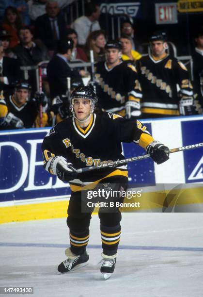 Luc Robitaille of the Pittsburgh Penguins skates on the ice during an NHL game against the New York Rangers on January 25, 1995 at the Madison Square...