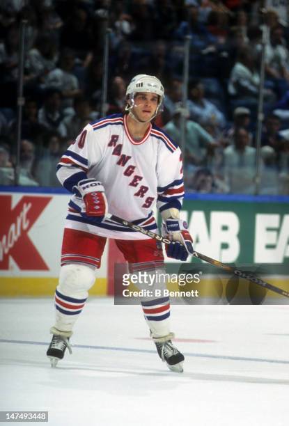 Luc Robitaille of the New York Rangers skates on the ice during an NHL game against the New York Islanders on October 17, 1995 at the Nassau Coliseum...