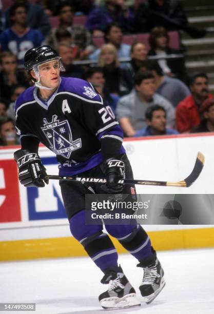 Luc Robitaille of the Los Angeles Kings skates on the ice during an NHL game against the New Jersey Devils on October 28, 1998 at the Continental...