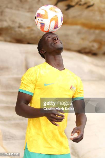 Awer Mabil juggles a ball as heposes during an Australian Socceroos media opportunity at Mrs Macquarie's Chair on March 21, 2023 in Sydney, Australia.