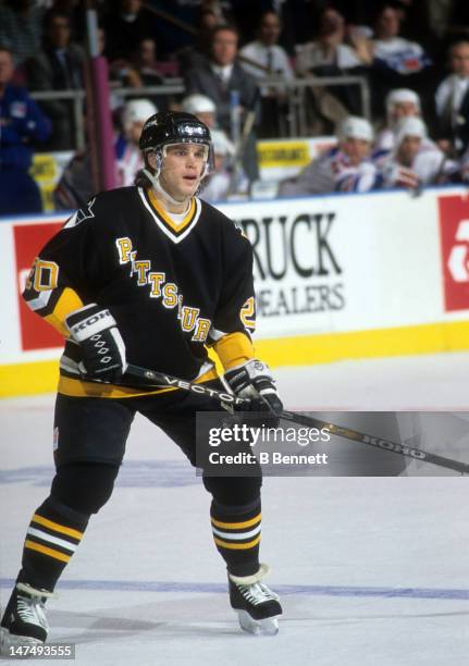 Luc Robitaille of the Pittsburgh Penguins skates on the ice during an NHL game against the New York Rangers on January 25, 1995 at the Madison Square...