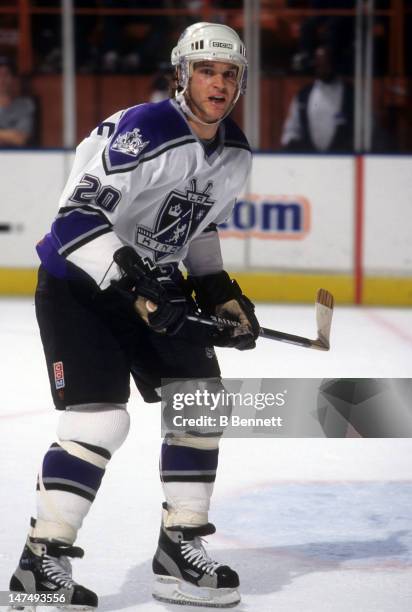 Luc Robitaille of the Los Angeles Kings skates on the ice during an NHL game in November, 1998 at the Great Western Forum in Inglewood, California.