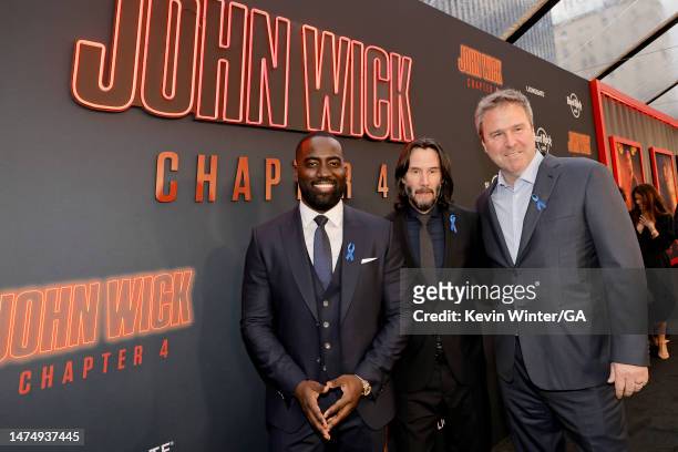 Shamier Anderson, Keanu Reeves, and Basil Iwanyk attend the Los Angeles Premiere of Lionsgate's "John Wick: Chapter 4" at TCL Chinese Theatre on...