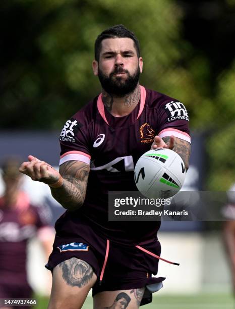 Adam Reynolds passes the ball during a Brisbane Broncos NRL training session at Clive Berghofer Field on March 21, 2023 in Brisbane, Australia.