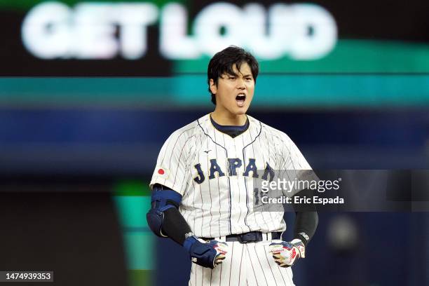 Shohei Ohtani of Team Japan celebrates at second base after hitting a double in the ninth inning against Team Mexico during the World Baseball...