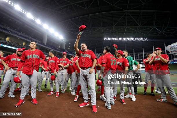 Manager Benji Gil acknowledges the crowd after losing 6-5 to Team Japan during the World Baseball Classic Semifinals at loanDepot park on March 20,...