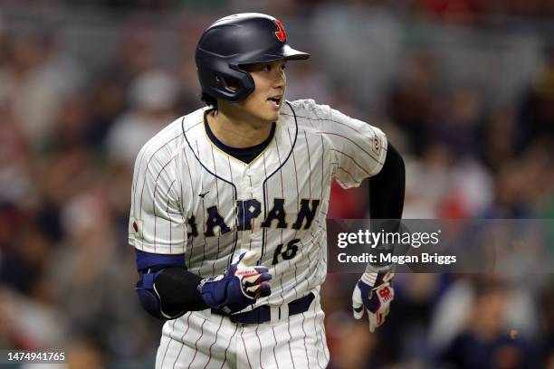 Shohei Ohtani of Team Japan hits a double in the ninth inning against Team Mexico during the World Baseball Classic Semifinals at loanDepot park on...